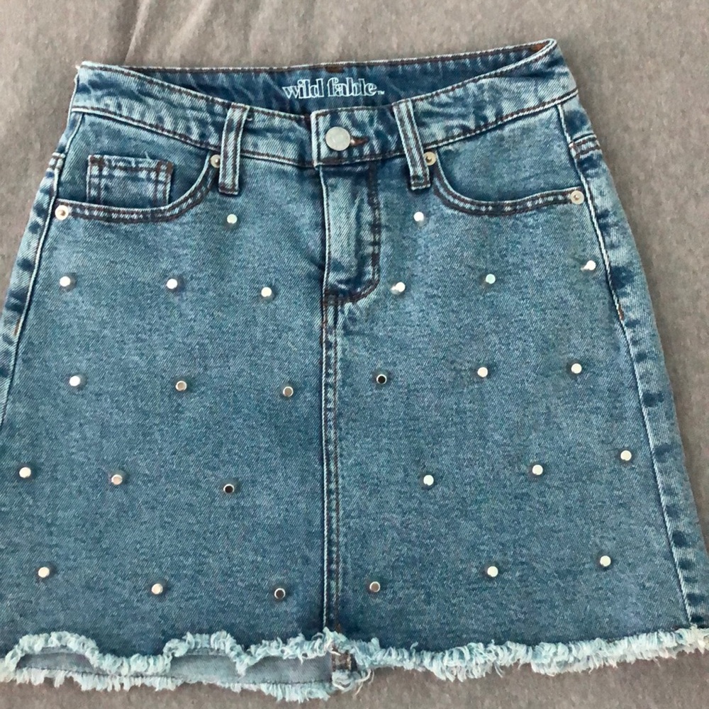 A studded jean skirt